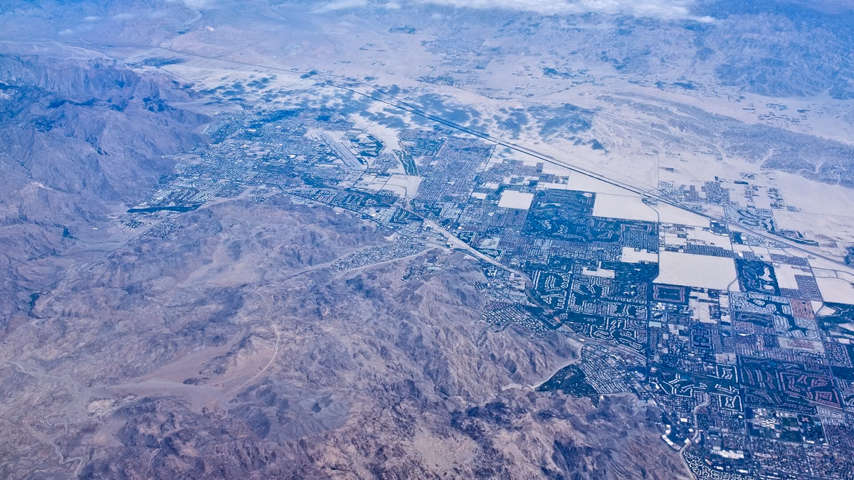 View of Palm Springs California (with Palm Springs International Airport), Cathedral City California, and Thousand Palms California, from the air